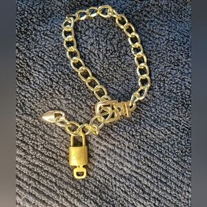 Autheintic LOUIS VUITTON #308 Brass Lock And Key With Chain.  See Photos